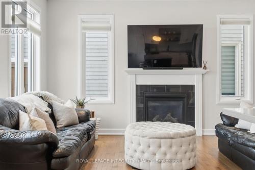 52 Hackamore Crescent, Ottawa, ON - Indoor Photo Showing Living Room With Fireplace