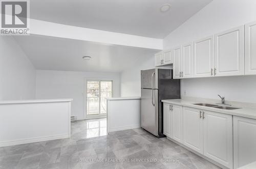 Apartment #4 - 3263 Lake Shore Boulevard W, Toronto, ON - Indoor Photo Showing Kitchen With Double Sink