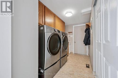 Convenient Laundry Room with Garage Access - 236 O'Donoghue Avenue, Oakville, ON - Indoor Photo Showing Laundry Room