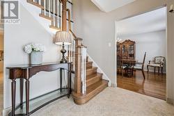 Hardwood Staircase to the Upper Level - 