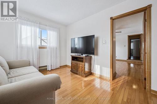 In-Law/Guest Suite Family Room w/Hardwood Flooring - 236 O'Donoghue Avenue, Oakville, ON - Indoor Photo Showing Living Room