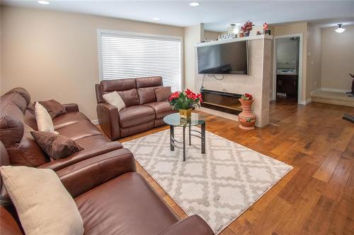 2 455 Pandora Avenue W, Winnipeg, MB - Indoor Photo Showing Living Room With Fireplace