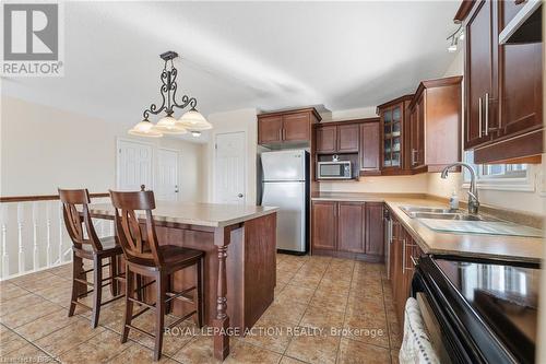 28 Mansfield Drive, Brant, ON - Indoor Photo Showing Kitchen With Double Sink