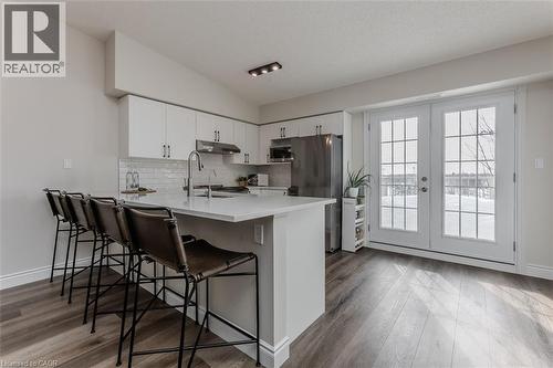 1450 Bishops Gate Unit# 401, Oakville, ON - Indoor Photo Showing Kitchen With Stainless Steel Kitchen With Upgraded Kitchen