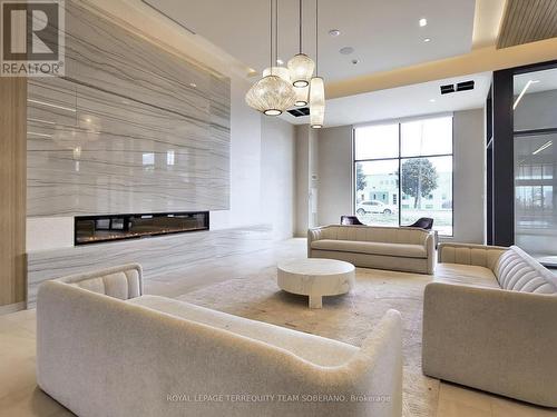 Ph109 - 8960 Jane Street, Vaughan, ON - Indoor Photo Showing Other Room With Fireplace