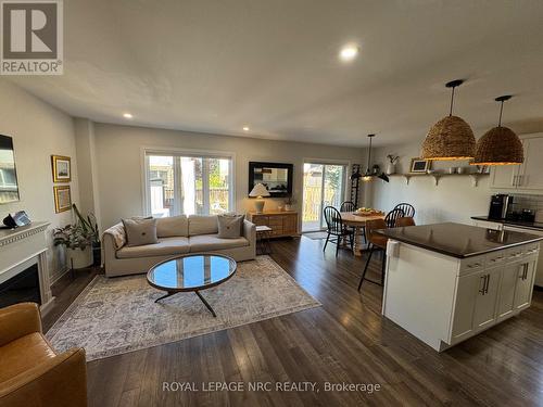 Open concept layout - 11 Violet Street, St. Catharines (Grapeview), ON - Indoor Photo Showing Living Room With Fireplace
