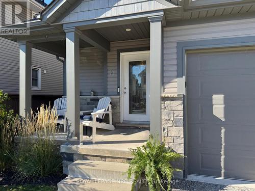 Sitting area on front porch - 11 Violet Street, St. Catharines (Grapeview), ON - Outdoor With Exterior
