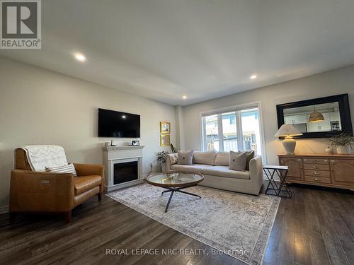 Living room main floor - 11 Violet Street, St. Catharines (Grapeview), ON - Indoor Photo Showing Living Room With Fireplace