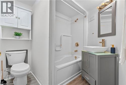 Full bathroom featuring vanity, shower / bathtub combination, and light wood-style flooring - 146 Appalachian Crescent Unit# Lower, Kitchener, ON - Indoor Photo Showing Bathroom