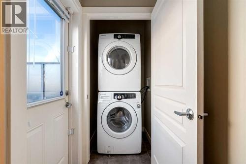 705 Evanston Square Nw, Calgary, AB - Indoor Photo Showing Laundry Room