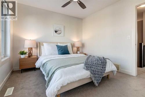 705 Evanston Square Nw, Calgary, AB - Indoor Photo Showing Bedroom