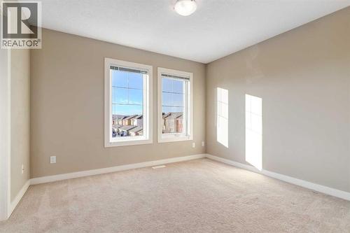 705 Evanston Square Nw, Calgary, AB - Indoor Photo Showing Other Room