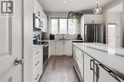 Kitchen - 1969 Rangeview Drive Se, Calgary, AB - Indoor Photo Showing Kitchen