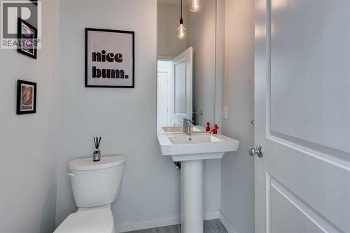 Powder room - 1969 Rangeview Drive Se, Calgary, AB - Indoor Photo Showing Bathroom