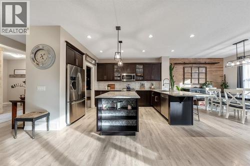 159 Riviera View, Cochrane, AB - Indoor Photo Showing Kitchen With Stainless Steel Kitchen With Upgraded Kitchen