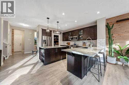 159 Riviera View, Cochrane, AB - Indoor Photo Showing Kitchen With Stainless Steel Kitchen With Upgraded Kitchen