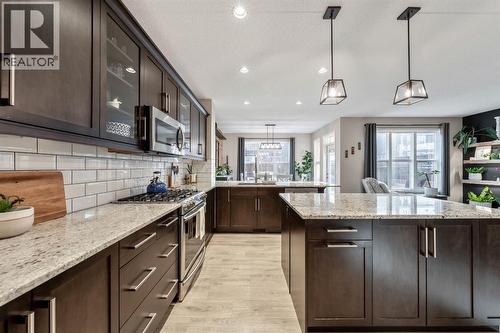 159 Riviera View, Cochrane, AB - Indoor Photo Showing Kitchen With Upgraded Kitchen