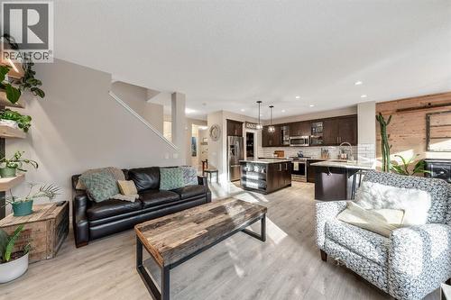 159 Riviera View, Cochrane, AB - Indoor Photo Showing Living Room