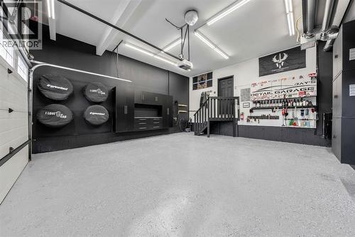 159 Riviera View, Cochrane, AB - Indoor Photo Showing Garage