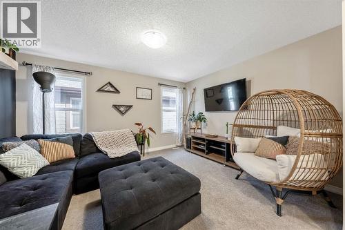 159 Riviera View, Cochrane, AB - Indoor Photo Showing Living Room