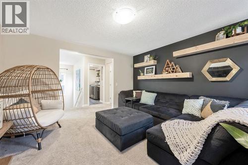 159 Riviera View, Cochrane, AB - Indoor Photo Showing Living Room