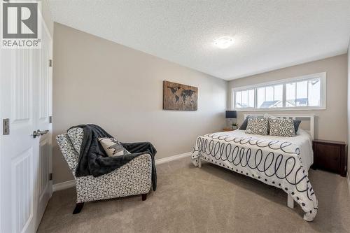 159 Riviera View, Cochrane, AB - Indoor Photo Showing Bedroom