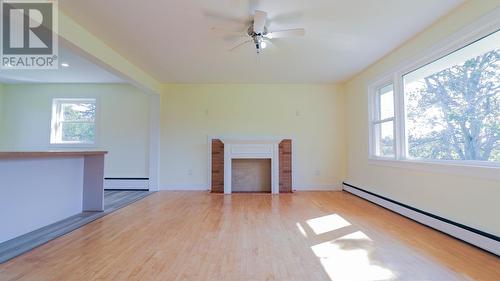 6 Dairy Lane, Stratford, PE - Indoor Photo Showing Other Room With Fireplace