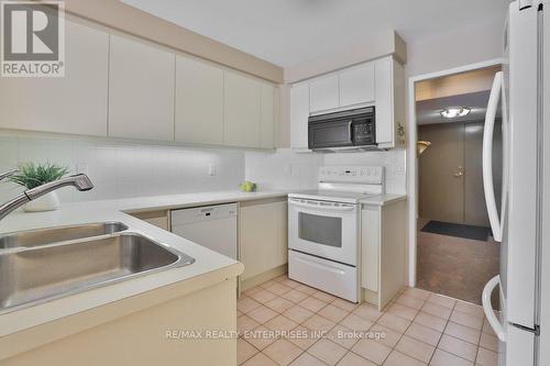 211 - 1800 The Collegeway, Mississauga, ON - Indoor Photo Showing Kitchen With Double Sink