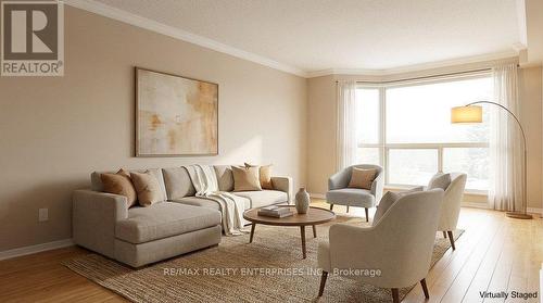 Large bright living room staged - 211 - 1800 The Collegeway, Mississauga, ON - Indoor Photo Showing Living Room
