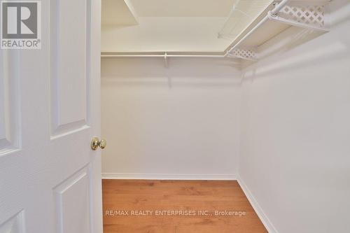 Large Primary Walk in Closet - 211 - 1800 The Collegeway, Mississauga, ON - Indoor With Storage
