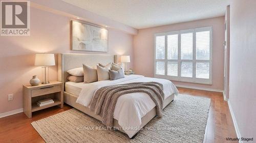 Primary bedroom staged - 211 - 1800 The Collegeway, Mississauga, ON - Indoor Photo Showing Bedroom