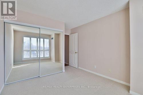 2nd bedroom with large double closet - 211 - 1800 The Collegeway, Mississauga, ON - Indoor Photo Showing Other Room