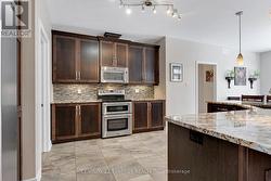 Maytag appliances and granite countertops - 