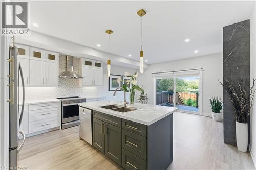Virtually Staged - 74 Melbourne Street, Hamilton, ON - Indoor Photo Showing Kitchen With Stainless Steel Kitchen With Double Sink With Upgraded Kitchen