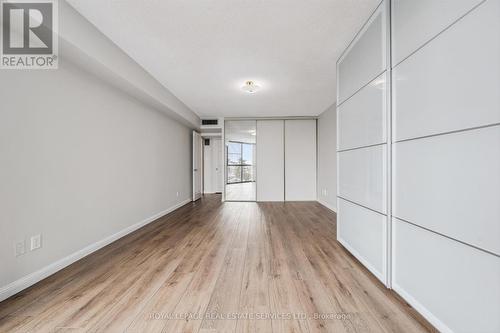 Spacious Bedroom w/New Engineered Hardwood Floor - 702 - 1240 Marlborough Court, Oakville, ON - Indoor Photo Showing Other Room