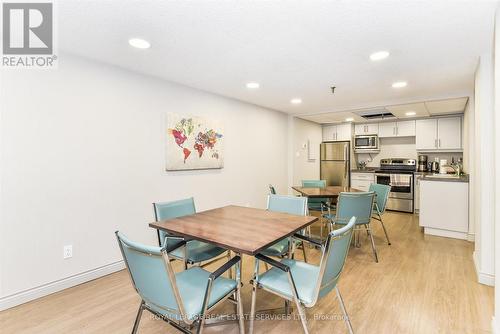 Party Room with Kitchen - 702 - 1240 Marlborough Court, Oakville, ON - Indoor Photo Showing Dining Room