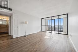 The Living Room Opens to the Sun-Filled Solarium - 