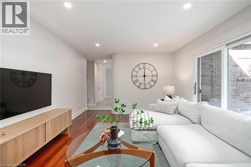 Living area with wood finished floors and recessed lighting - 4226 Dunvegan Road, Burlington, ON - Indoor Photo Showing Living Room