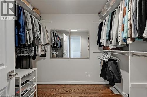 Spacious closet featuring dark wood finished floors - 4226 Dunvegan Road, Burlington, ON - Indoor With Storage