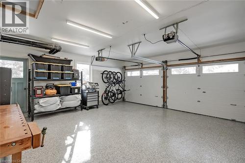 Garage with a garage door opener - 4226 Dunvegan Road, Burlington, ON - Indoor Photo Showing Garage