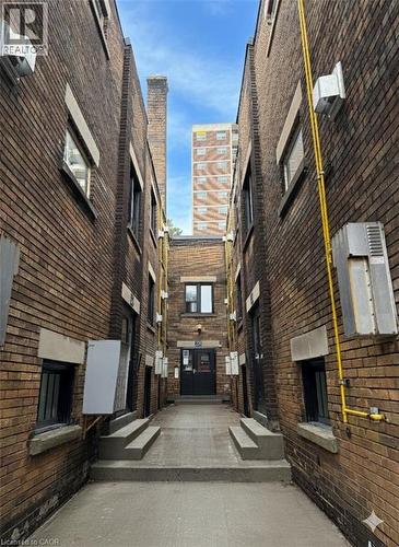 View of apartment building / complex - 46 College Street, Kitchener, ON -  Photo Showing Other Room With Fireplace