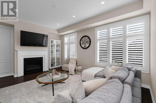 33 Westbury Way, Whitby, ON - Indoor Photo Showing Living Room With Fireplace