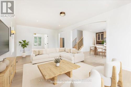 Image is Virtually Staged - 147 Lake Drive E, Georgina, ON - Indoor Photo Showing Living Room