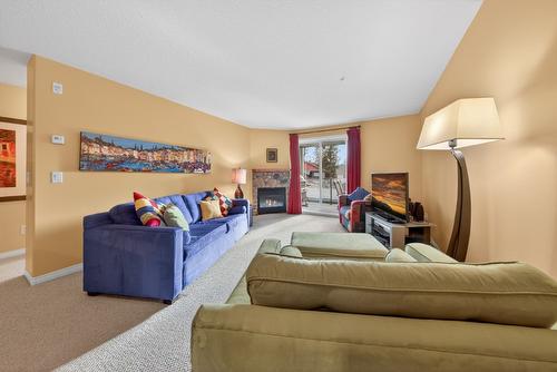 205-4767 Forsters Landing Road, Radium Hot Springs, BC - Indoor Photo Showing Living Room With Fireplace
