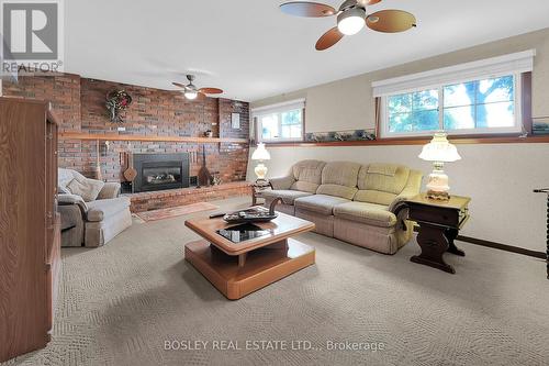 25 Lawrence Drive, Thorold (Confederation Heights), ON - Indoor Photo Showing Living Room With Fireplace