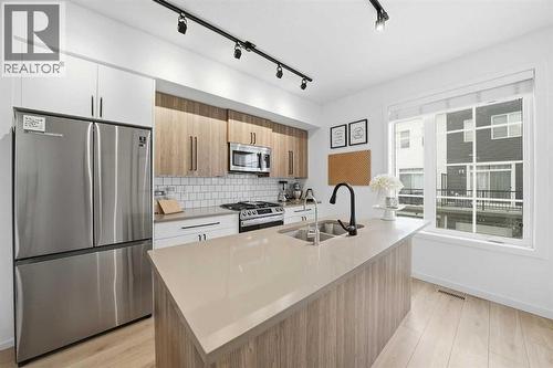 93 Walgrove Common Se, Calgary, AB - Indoor Photo Showing Kitchen With Stainless Steel Kitchen With Double Sink With Upgraded Kitchen