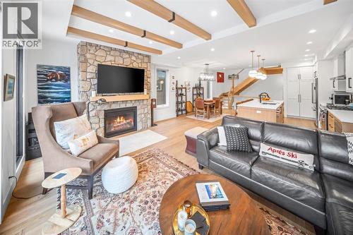 4, 810 3Rd Street, Canmore, AB - Indoor Photo Showing Living Room With Fireplace