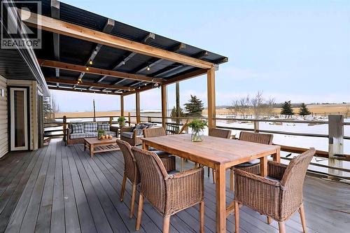Disclaimer! This Photo is virtually staged - 284226 Township Road 254, Rural Rocky View County, AB - Outdoor With Deck Patio Veranda With Exterior