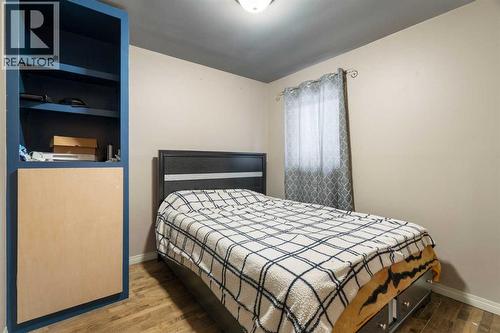 Main floor 3rd bedroom - 284226 Township Road 254, Rural Rocky View County, AB - Indoor Photo Showing Bedroom