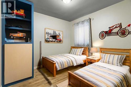 Disclaimer! This Photo is virtually staged. Main Floor- Bedroom#3- ideal for an Office room or Kids room - 284226 Township Road 254, Rural Rocky View County, AB - Indoor Photo Showing Bedroom